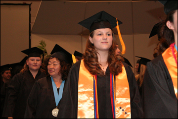 Honor graduates wear the golden tassel. The Golden scarf represents a Phi Theta Kappa graduate.