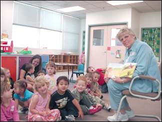 Dr. Mary Retterer reading to the children